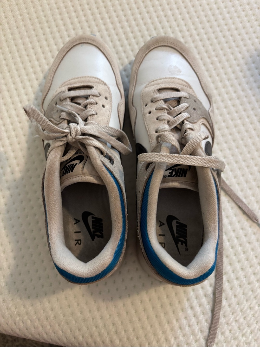 Nike Kids White and Beige Sneakers with Blue Accent